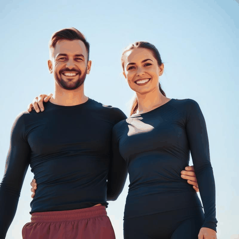 Happy couple enjoying wellness and vitality after hormone therapy and weight loss treatment in Breckenridge TX